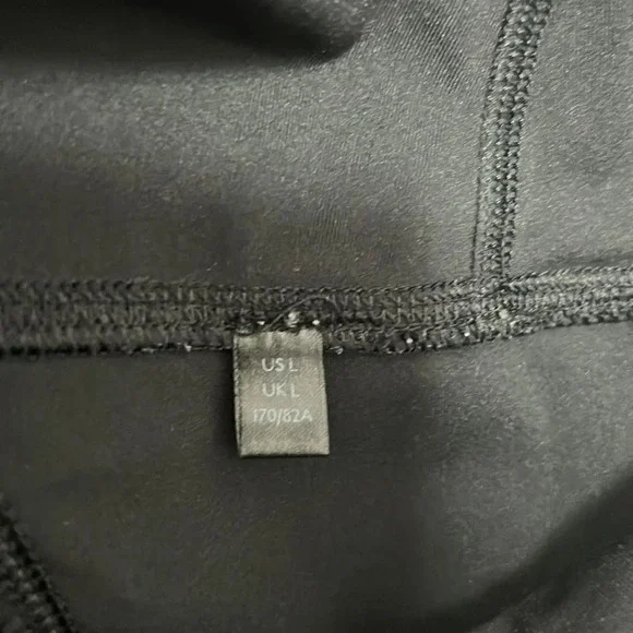 Free People Movement High Rise Black Leggings size Large with side Pockets - Picture 9 of 10